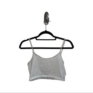 white loose-fitting tna tank top